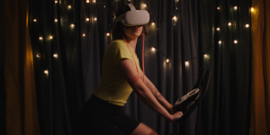 HOLOFIT VR Cycling Workout on Oculus Quest in bedroom with fairly lights